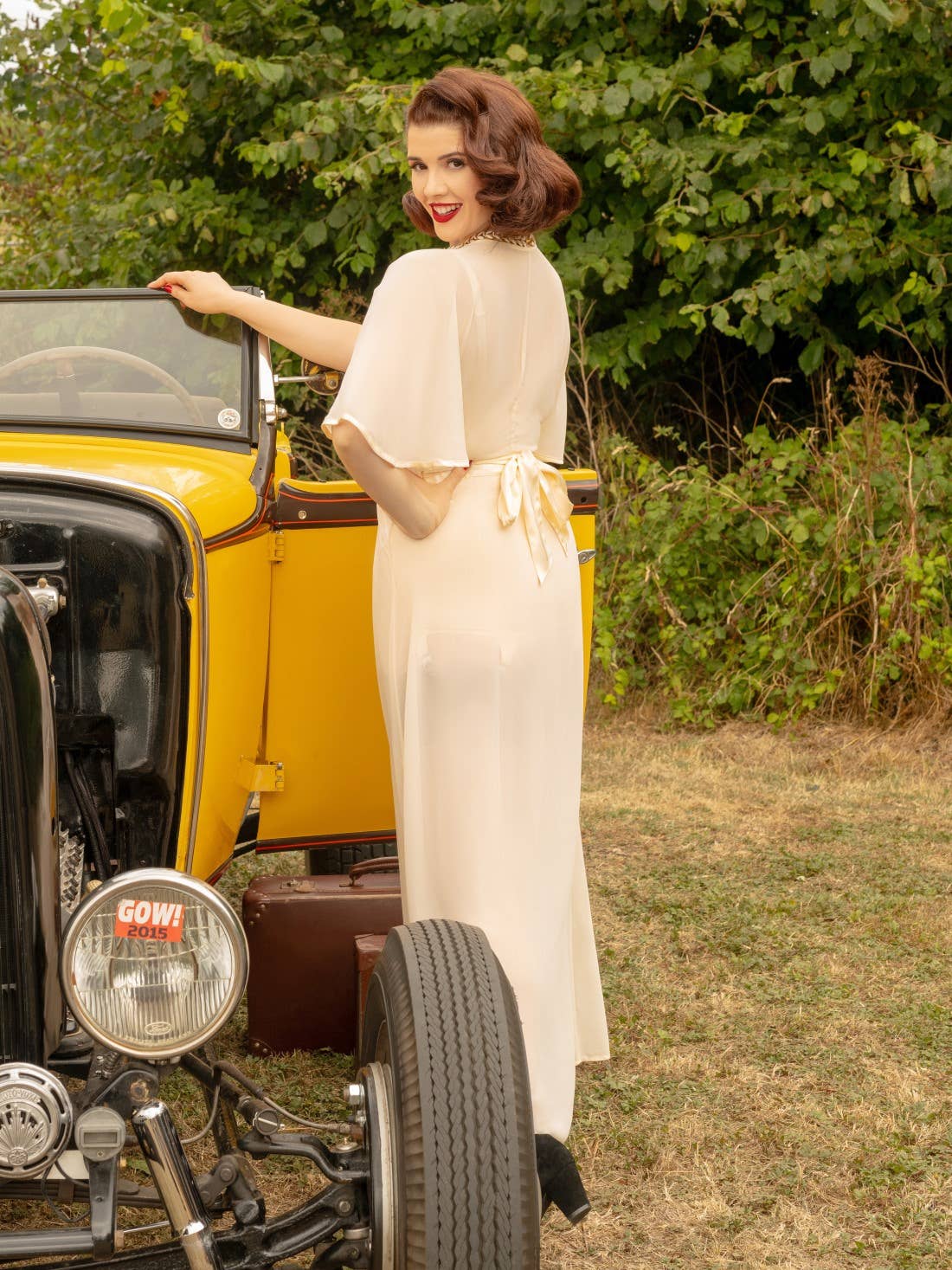 1930-tals transparent morgonrock i persikofärg med fjärilsärm